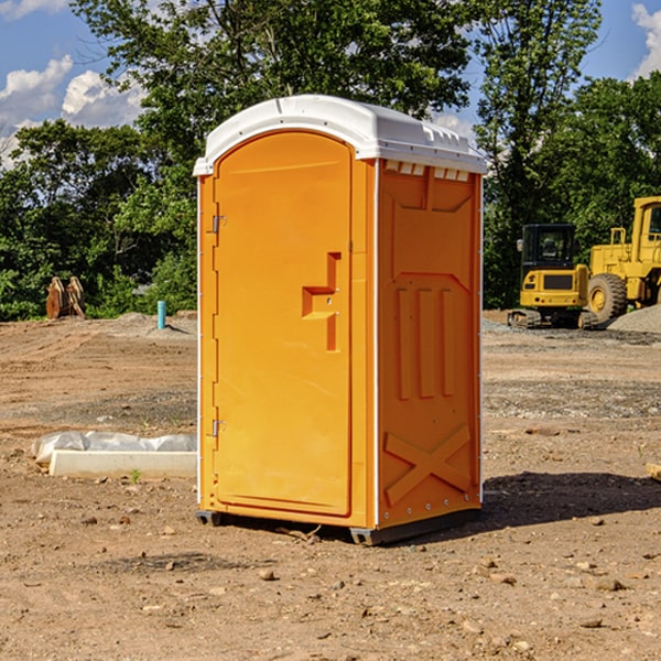 how often are the portable toilets cleaned and serviced during a rental period in Carroll County IA